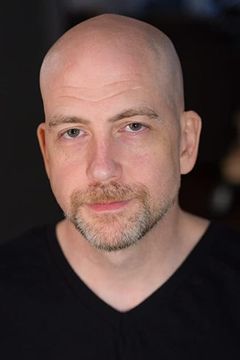 David Oelert interpreta National Guardsman (uncredited)