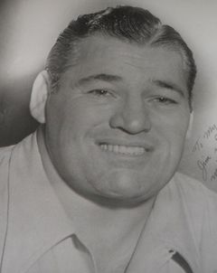 Ted Christy interpreta Gangster (uncredited)