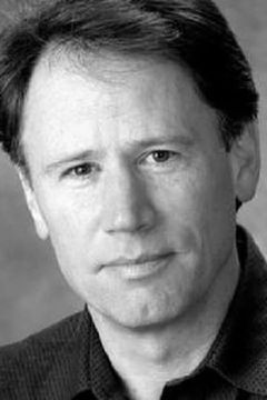 John Stephen Hill interpreta Communications Officer