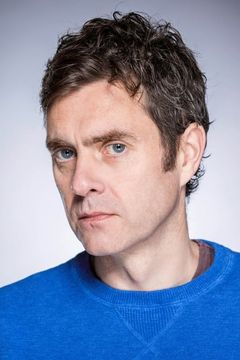 Paul Higgins interpreta Minister