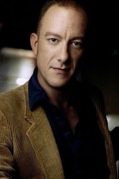 John Shaw interpreta Mr. Draybick