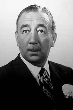 Melville Cooper interpreta Mr. Tringle