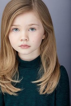 Josie M. Parker interpreta Laine