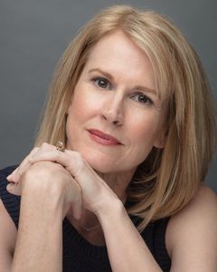 Nan McNamara interpreta Trudy Sherman