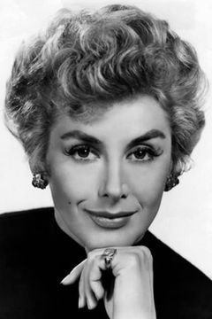 Kay Kendall interpreta Sheila Broadbent
