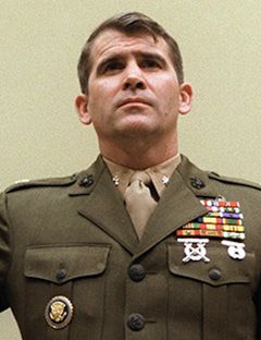Oliver North interpreta Self - US Military Officer (archive footage)