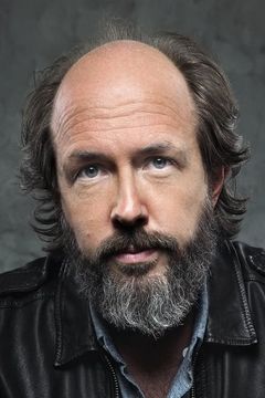 Eric Lange interpreta John Skrzynski