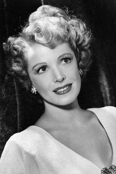 Natalie Schafer interpreta Mrs. Evans