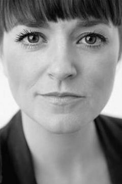 Kate Coogan interpreta Liz Holloway