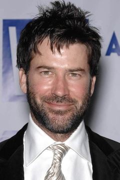 Joe Flanigan interpreta Jeff Reed