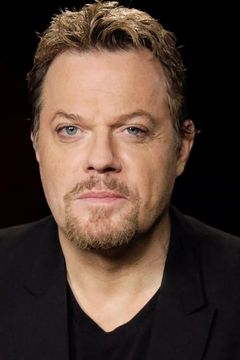 Eddie Izzard interpreta Dan Deakins