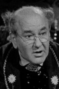 Charles Judels interpreta Cafe Owner Pere Mathieu (uncredited)