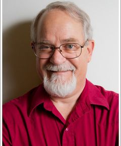 Neil McDonald interpreta Airport Goatee Guy
