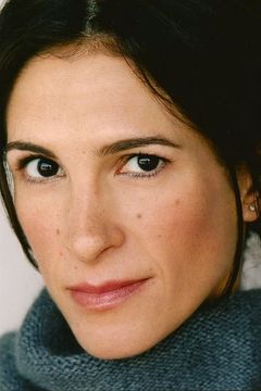 Julie Dretzin interpreta Rob's Assistant