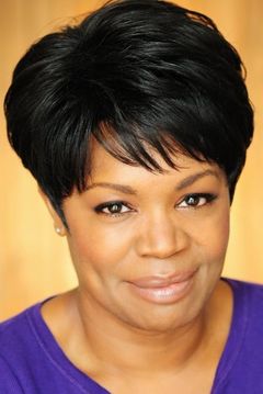 Monique Edwards interpreta Bank Teller