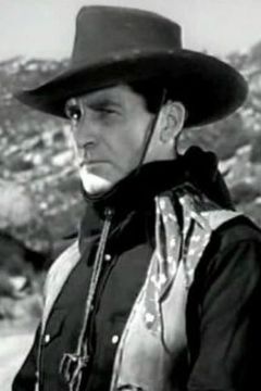 Joe McGuinn interpreta Guard (uncredited)