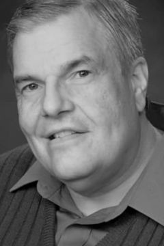 Craig Richard Nelson interpreta Professor Frederickson