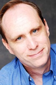 Jason Wells interpreta Tim