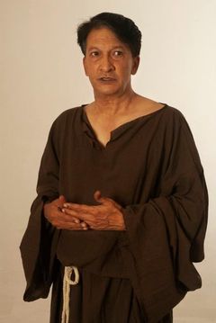Ashok Mandanna interpreta Ron Nair