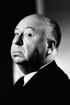 Alfred Hitchcock interpreta Man in Hotel Lobby with Baby (uncredited)