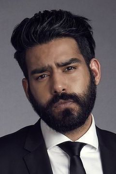 Rahul Kohli interpreta Ravi Chakrabarti