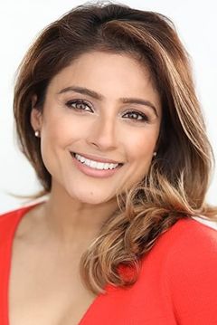 Meena Mann interpreta Journalist