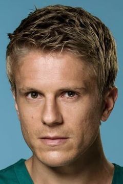 George Rainsford interpreta Waiter
