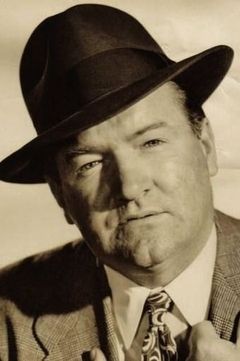 Barry Kelley interpreta Croupier