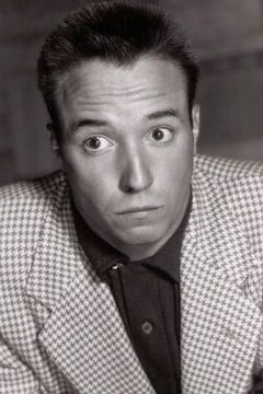 Dick Wesson interpreta Tourist Father
