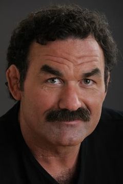 Don Frye interpreta Handler #1