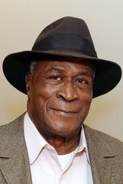 John Amos interpreta Major Grant