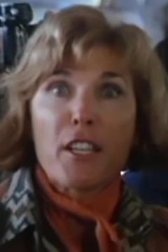 Helen Bentley interpreta Baba Wawa - TV Reporter