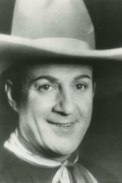 Jack Perrin interpreta Man on Sidewalk (uncredited)