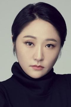 Kim Hyun-sook interpreta Ms. Min
