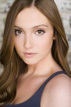 Sara Thompson interpreta Janine