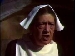 Madge Brindley interpreta Mrs. Figgins