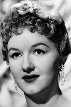 Joan Sims interpreta Betty
