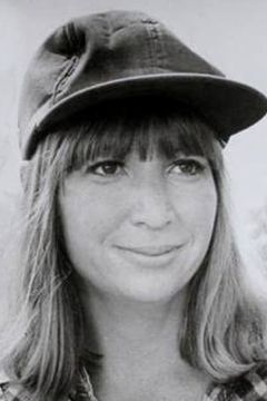Christine Forrest interpreta Birdcage Partygoer