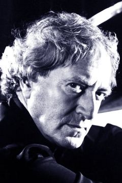 John Barry interpreta Orchestra Conductor (uncredited)