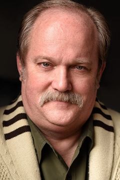 Michael H. Cole interpreta Another Reporter