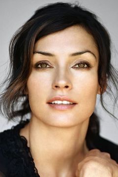 Famke Janssen interpreta Rachel