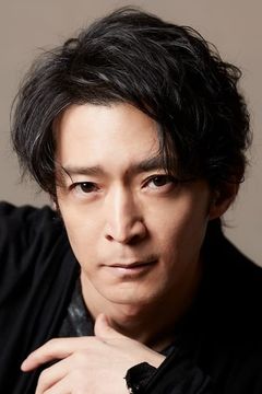 Kenjiro Tsuda interpreta Bacchus Groh (voice)