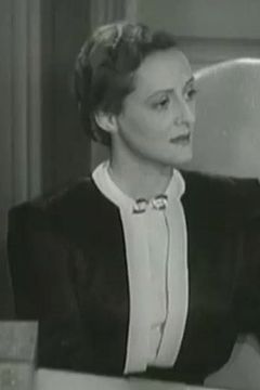 Mary Currier interpreta Miss Tedder (uncredited)
