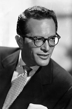 Robert Q. Lewis interpreta Himself (TV Presenter/Interviewer)