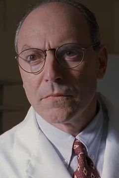 Dana Gladstone interpreta Col. Lawrence