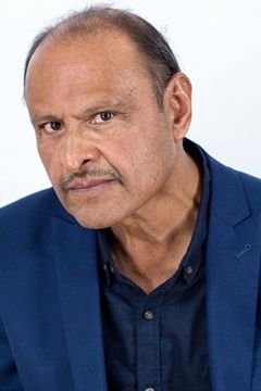 Jag Patel interpreta Prisoner (uncredited)