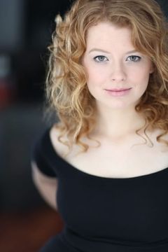 Paula Burrows interpreta Arlene