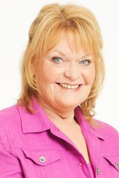 Janet Wright interpreta Trish
