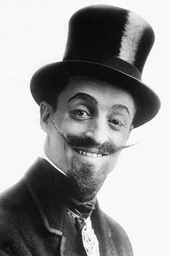 Leo White interpreta Emile - Waiter (uncredited)