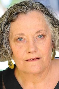Jayne Taini interpreta Susan Norris